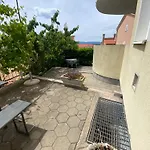 Em * Malinska